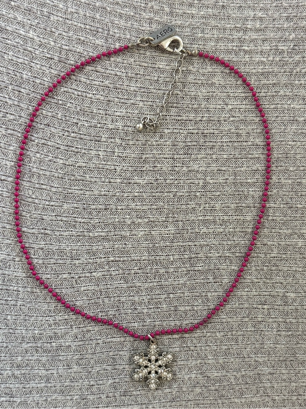 Y2K Aeropostale marked magenta beaded rhinestone studded snowflake necklace